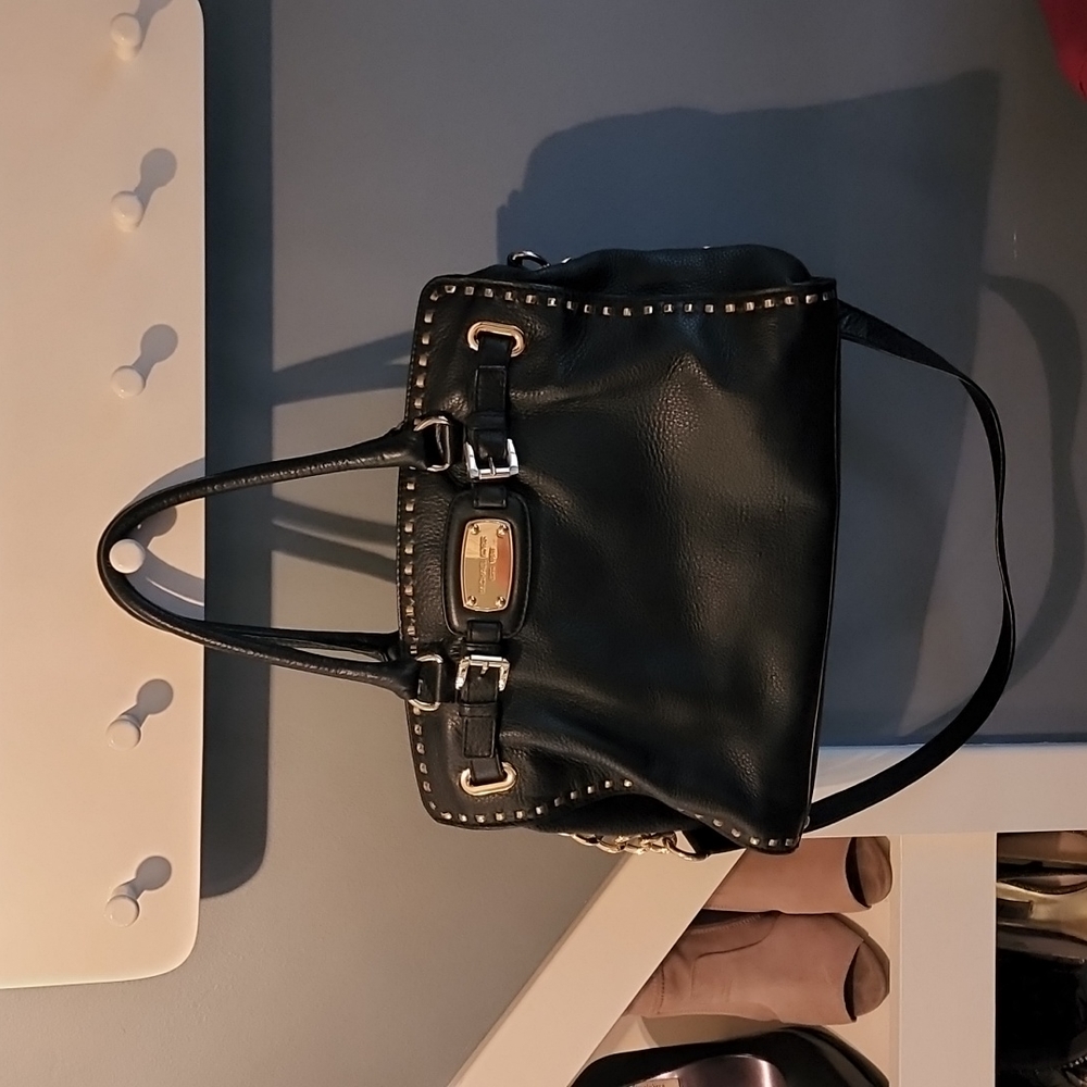 Authentic Michael Kors crossbody and shoulder leather bag with gold stitching